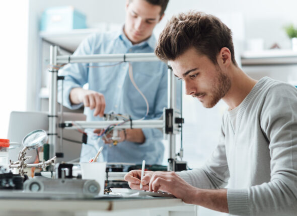 Engineering students working in the lab