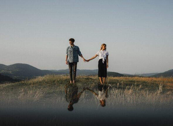 young-couple-standing-in-nature-in-countryside-ho-2022-01-18-23-32-27-utc-2048x1365